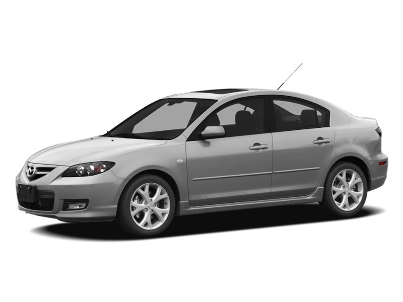 2009 Mazda Mazda3 4dr Sdn Man GX Sunlight Silver Metallic  Shot 8